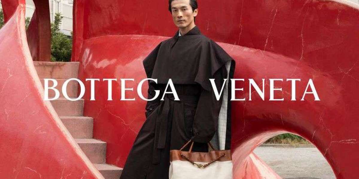 Bottega Veneta chic button up into a pair of loose blue
